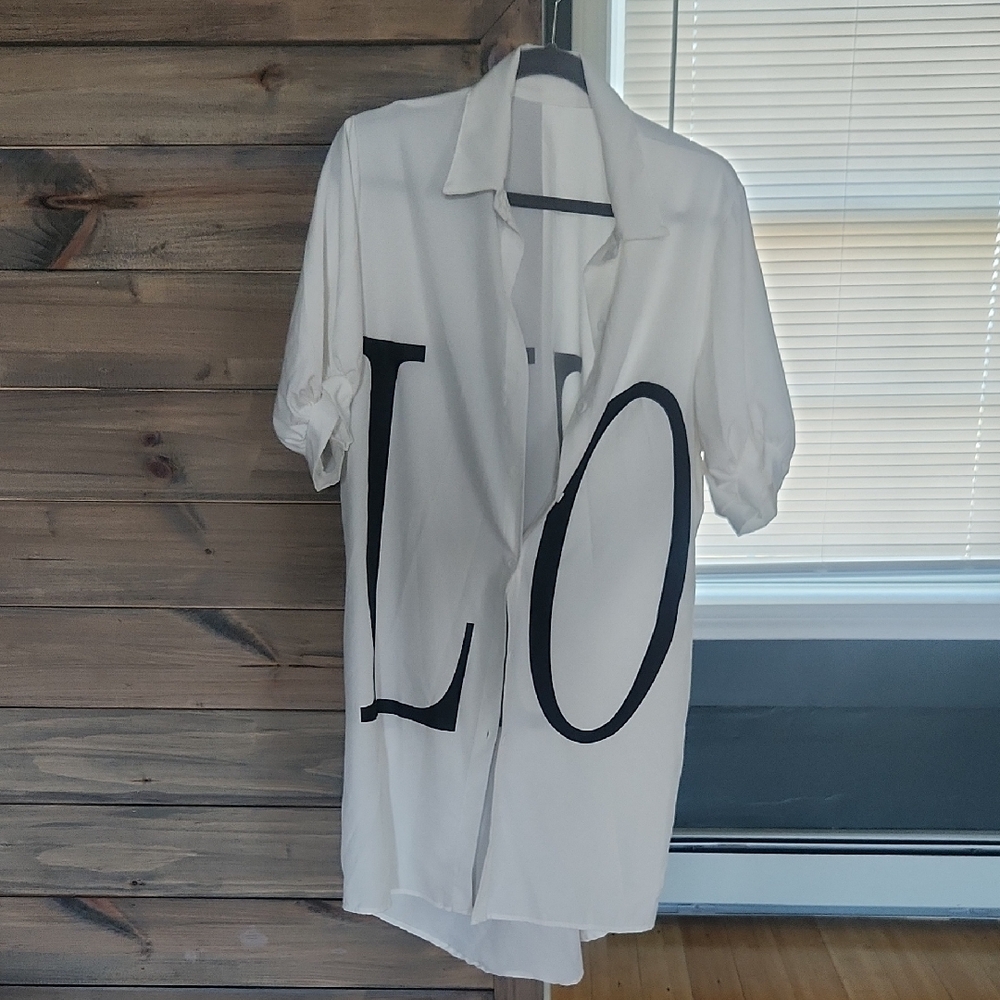 White Button-Up Shirt with Black Lettering
